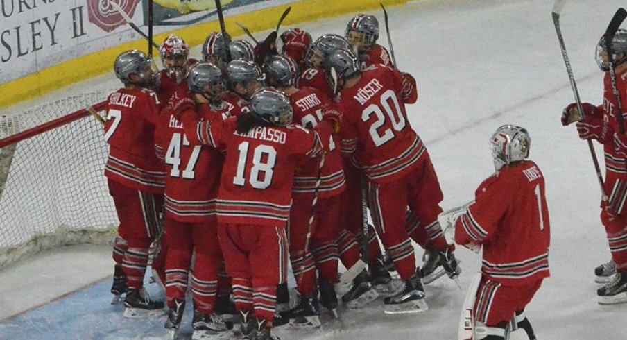 Ohio State men's hockey celebrates an 8-3 win over Minnesota.