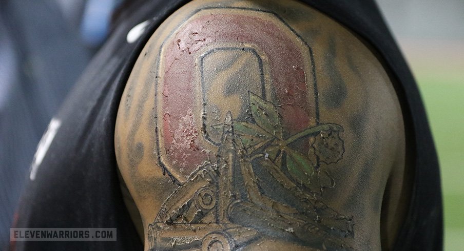 Ohio State linebacker Raekwon McMillan displays his new tattoo Wednesday at the WHAC.