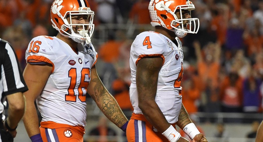 Dec 3, 2016; Orlando, FL, USA; Clemson Tigers quarterback Deshaun Watson (4) celebrates after scoring a touchdown against the Virginia Tech Hokies during the second half of the ACC Championship college football game at Camping World Stadium. The Clemson Tigers defeat the Virginia Tech Hokies 42-35. Mandatory Credit: Jasen Vinlove-USA TODAY Sports