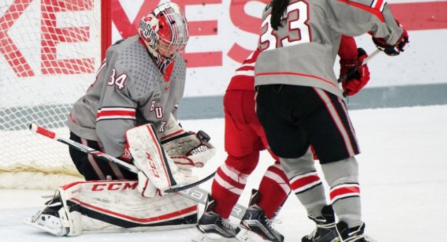 Ohio State goalie Kaylee Remington fends off a Wisconsin shot.