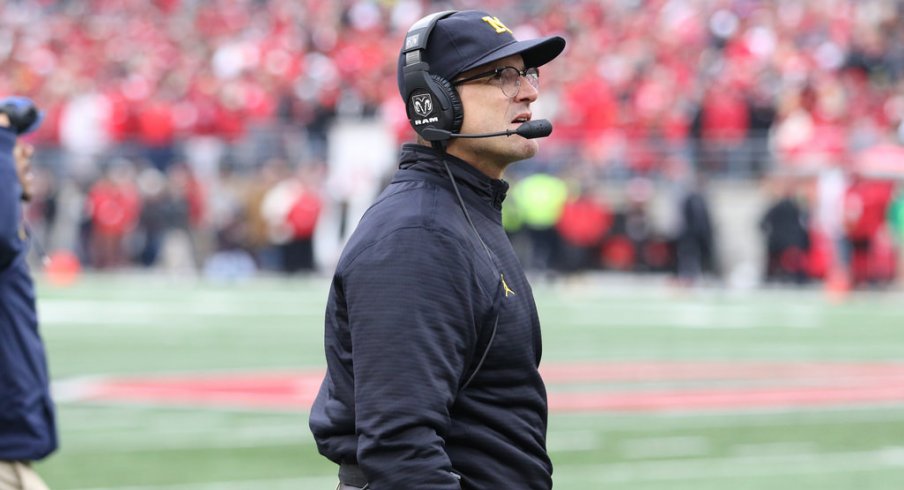 Michigan coach Jim Harbaugh on the sidelines at Ohio Stadium. 