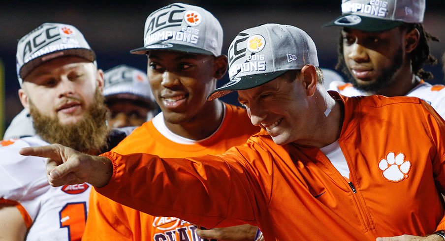 Clemson head coach Dabo Swinney points during the ACC Championship trophy celebration. Logan Bowles - USA TODAY Sports