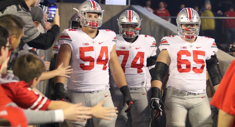 Billy Price, Pat Elflein take the field before Ohio State's game at Wisconsin. 