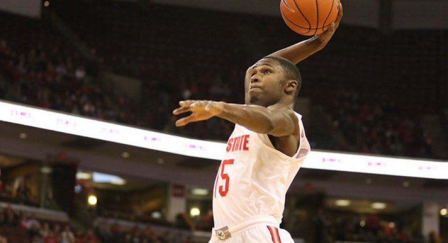 Ohio State guard Kam Williams slams the dunk home.