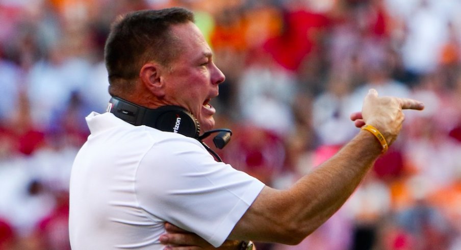 Butch Jones screams at his Tennessee player.