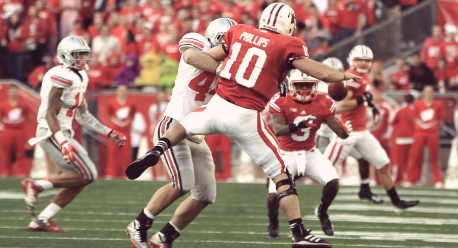 Ohio State linebacker Zach Boren makes a fumble against Wisconsin.