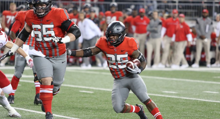 Pat Elflein and Mike Weber work together on a run earlier this season. 