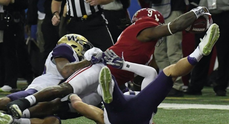 Dec 31, 2016; Atlanta, GA, USA; Alabama Crimson Tide running back Bo Scarbrough (9) reaches for a touchdown against the Washington Huskies during the first quarter in the 2016 CFP semifinal at the Peach Bowl at the Georgia Dome. Mandatory Credit: Dale Zanine-USA TODAY Sports