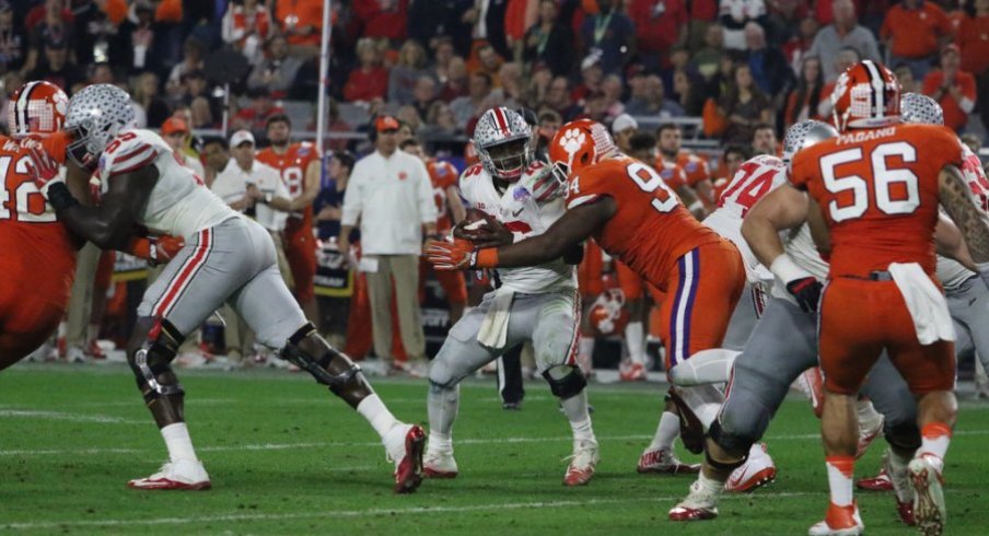 J.T. Barrett and his backfield mates had little room to operate against a stout Clemson front.