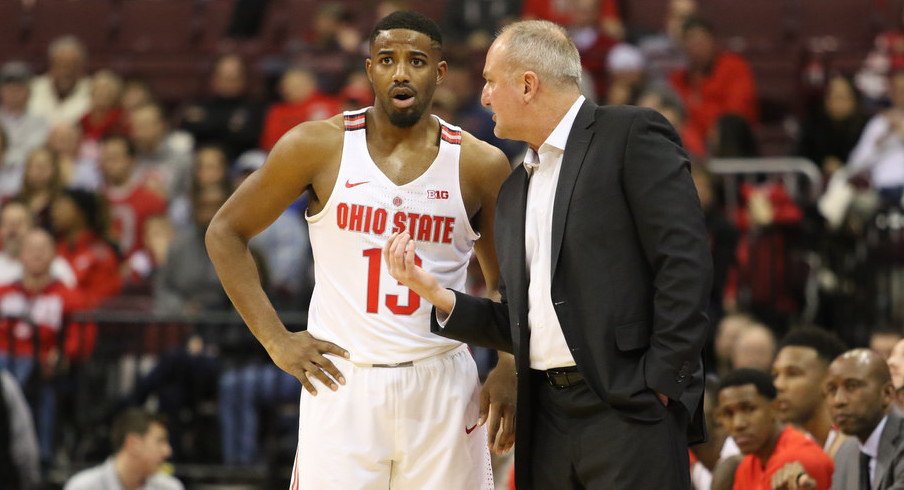 Ohio State's JaQuan Lyle and Thad Matta have a conversation.