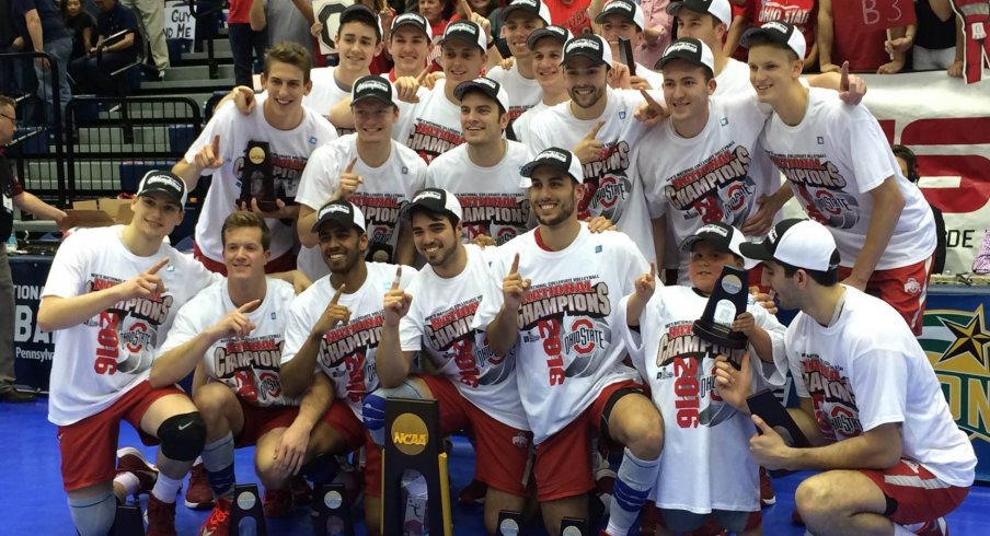 The Ohio State Men's Volleyball team poses with the national championship trophy after clinching the victory over BYU in 2016.