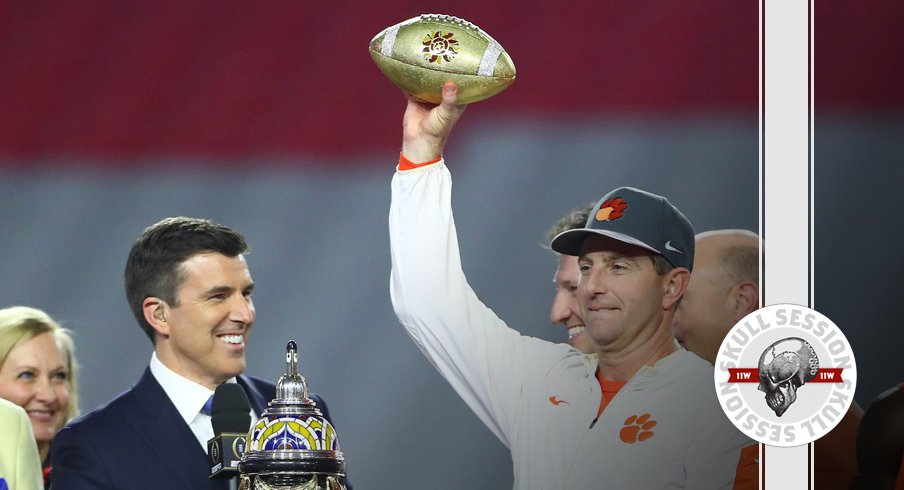 Dabo Swinney lifts the January 2nd 2016 Skull Session over his head.