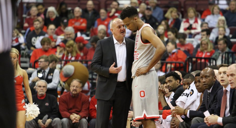 Thad Matta talks with Trevor Thompson during a game earlier this season. 