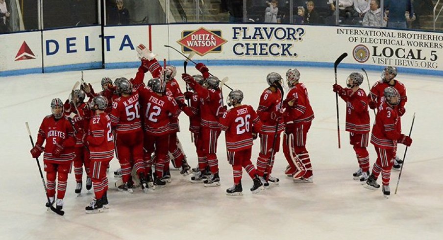 Ohio State men's hockey celebrates a 6-3 victory over Penn State.