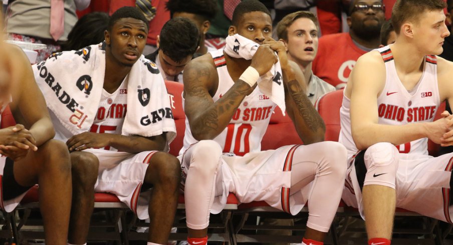 Kam Williams, Dave Bell and Micah Potter on the bench during Ohio State's loss to Northwestern.