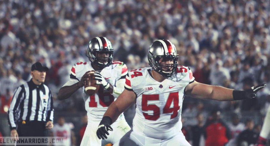 J.T. Barrett drops back to pass in 2014.