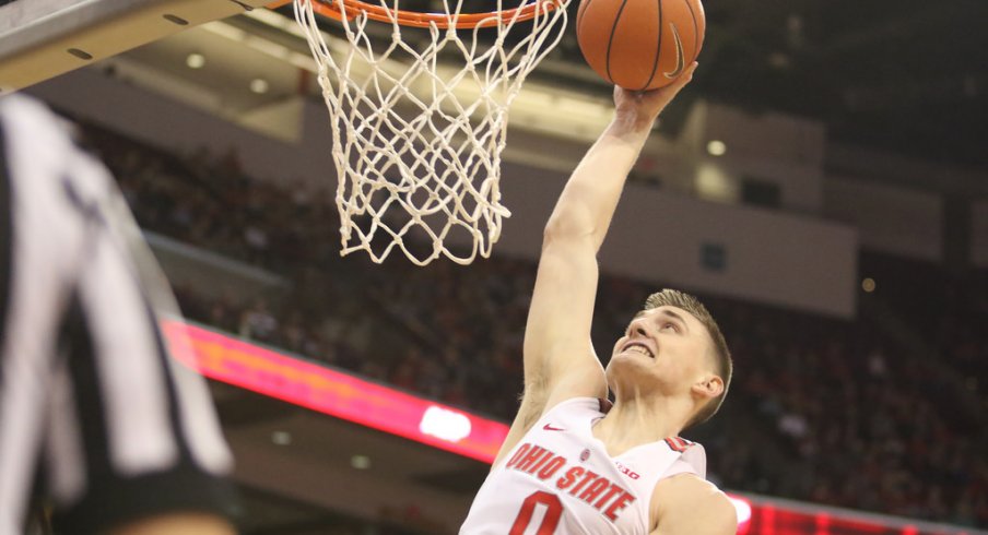 Ohio State's Micah Potter dunks during Sunday's game against Northwestern. 