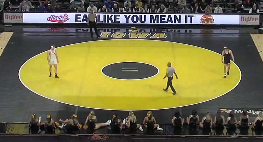 No. 4 Kollin Moore prepares for his match in Iowa City