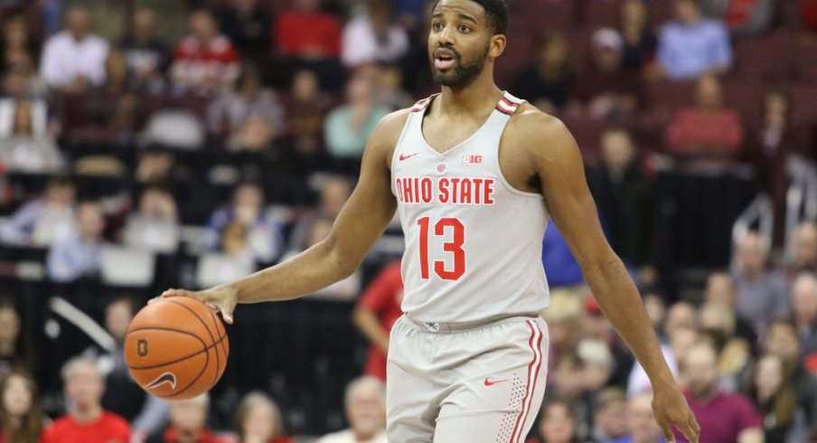 Ohio State point guard JaQuan Lyle dribbles up the floor.