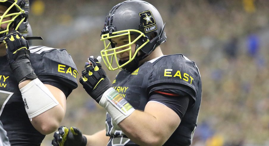 Urban Meyer sees Josh Myers and Wyatt Davis playing into the mix on Ohio State's offensive line immediately.