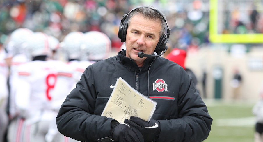Though it is his offense, Urban Meyer wants his trust his offensive coordinator enough where he can focus on other things as head coach.