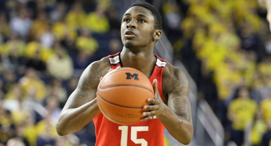 Ohio State guard Kam Williams shoots a free throw at Michigan.