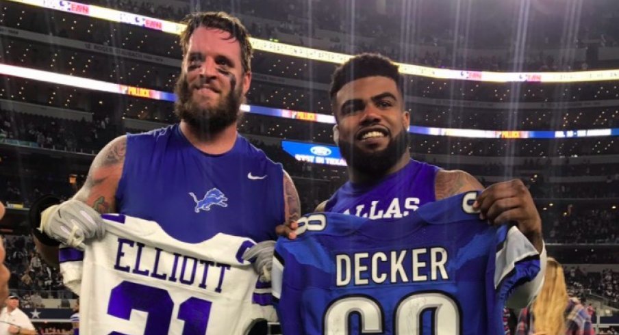 Taylor Decker and Ezekiel Elliott earlier this season. 