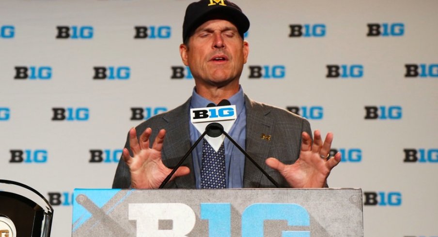Jim Harbaugh thinking about DAT ass.