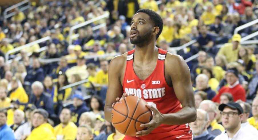 Ohio State's JaQuan Lyle takes a shot against Michigan.