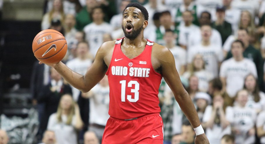 Ohio State point guard JaQuan Lyle dribbles up the court against Michigan State. 