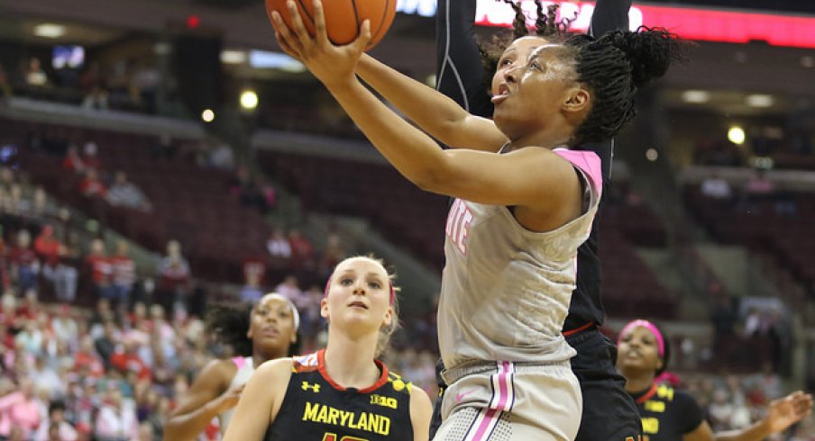 Kelsey Mitchell scores a contested layup against Maryland.