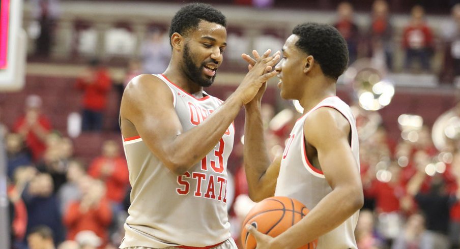 JaQuan Lyle and C.J. Jackson celebrate a win over Wisconsin.