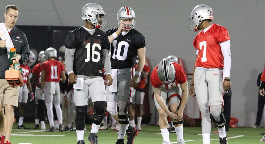 How Ohio State manages its quarterback snaps this spring is of great interest and concern to Urban Meyer.