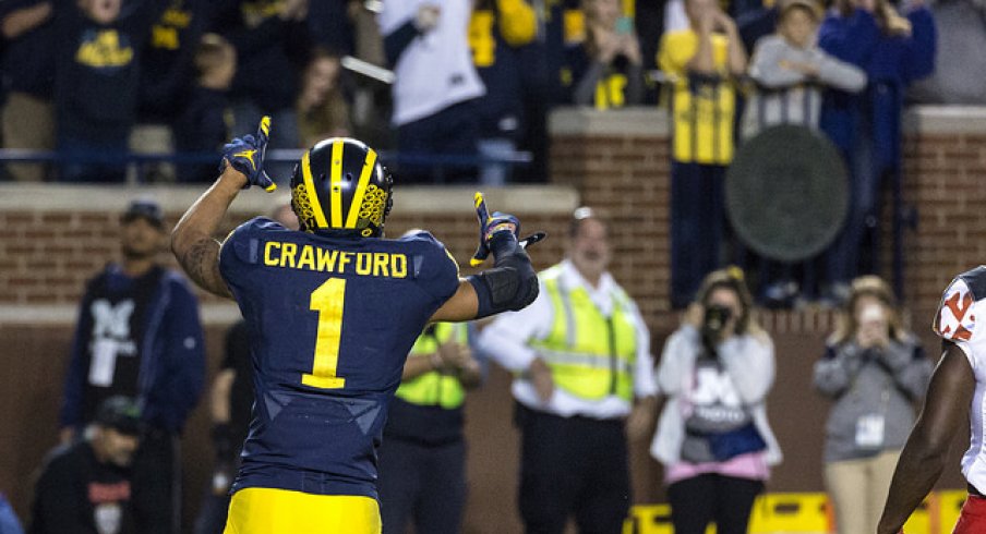 Kekoa Crawford and a talented group of young wideouts will help carry the load in Ann Arbor.