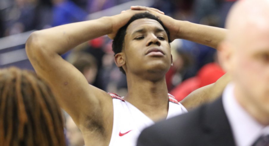 C.J. Jackson puts his hands on his head after Ohio State's loss to Rutgers.