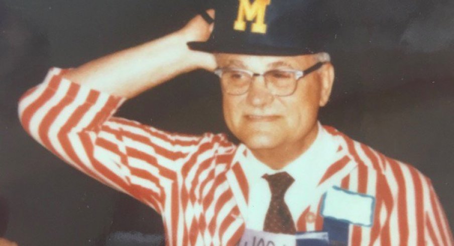 Woody Hayes wearing a Michigan hat.