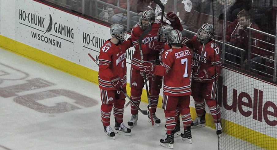 Ohio State men's hockey celebrates a goal against the Wisconsin Badgers.