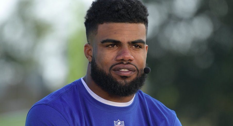 Ezekiel Elliott exposes a woman's breast.