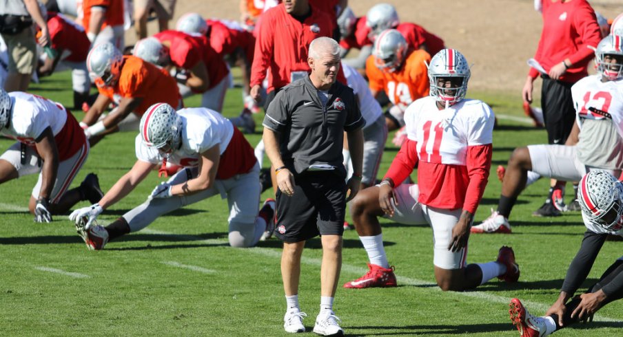 Ohio State cornerbacks coach Kerry Coombs walks through warmups at the Fiesta Bowl last season. 