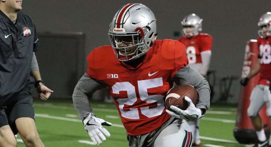 Ohio State running back Mike Weber carries the ball during spring practice. 