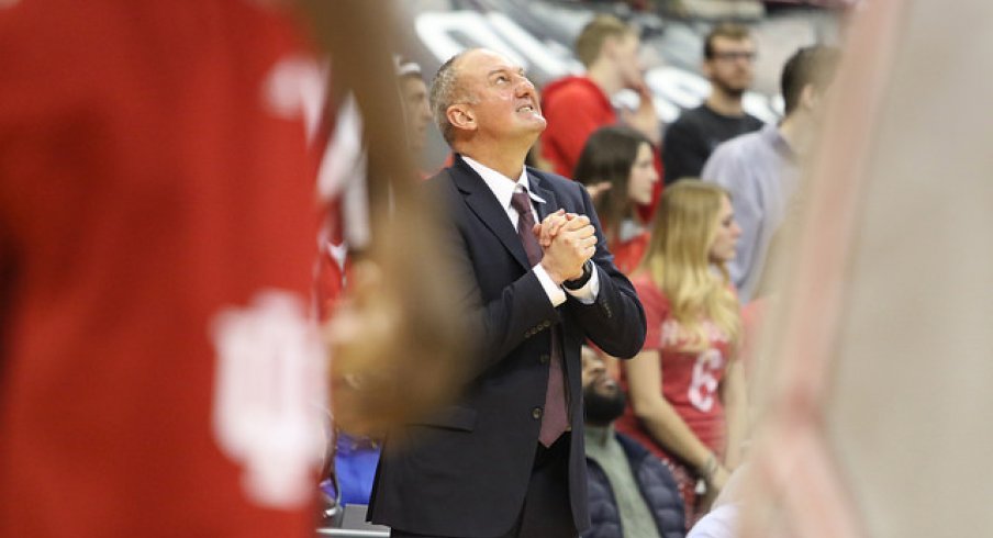 Thad Matta praying for a title run.