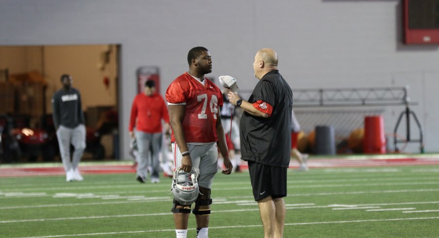 Ohio State's Jamarco Jones talks to Greg Studrawa during the spring.