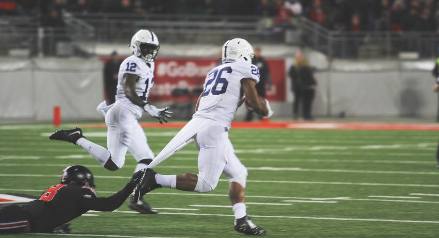 Saquon Barkley runs against Ohio State in 2015.