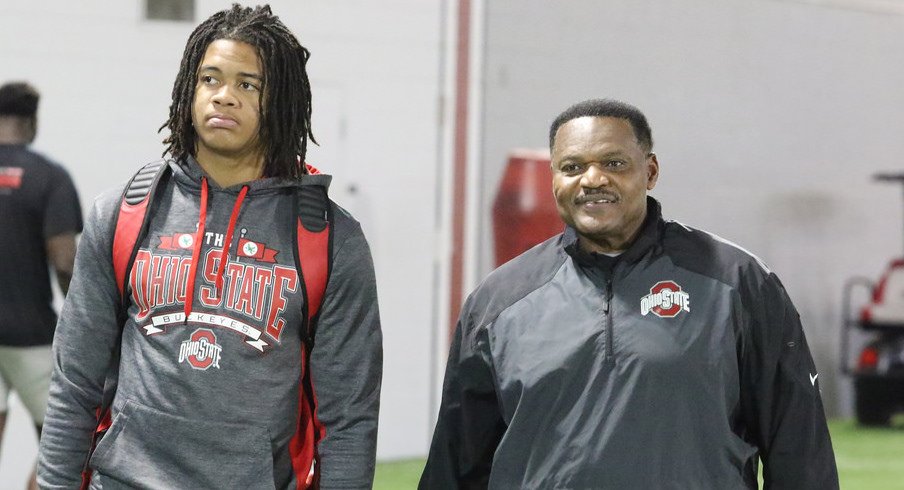 Ohio State signee Chase Young with defensive line coach Larry Johnson.