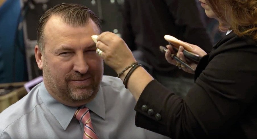 Large adult child Bret Bielema