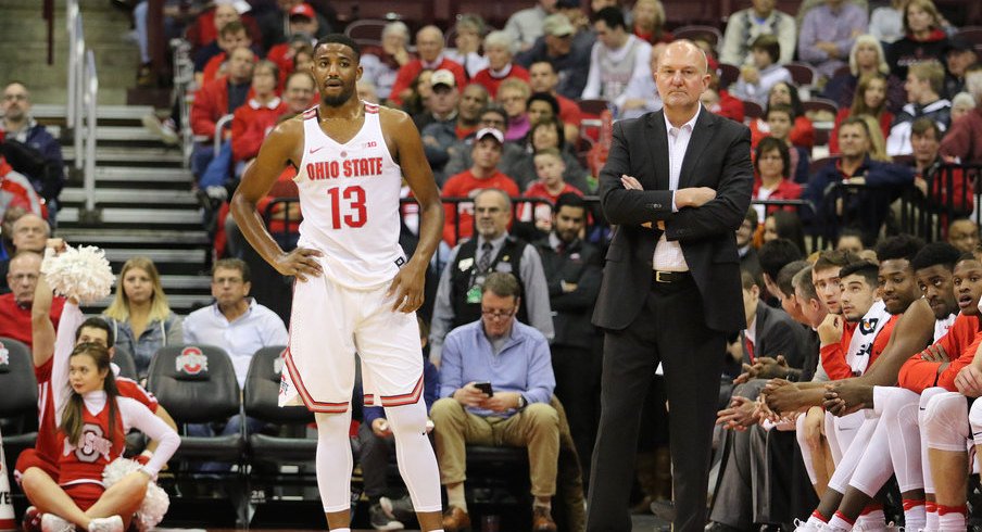 JaQuan Lyle and Thad Matta stand in front of Ohio State's bench last season.