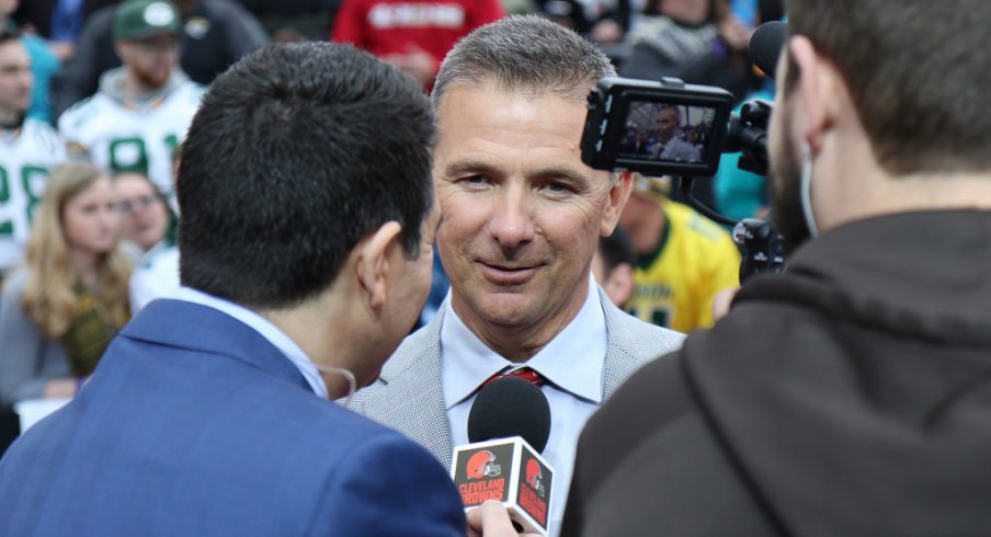 Urban Meyer conducts an interview