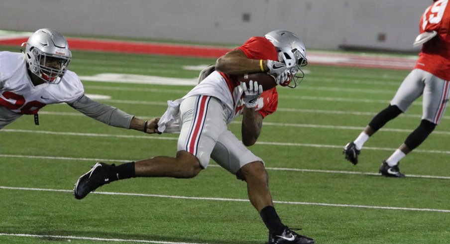 Ohio State's Brendon White is moving to safety. 