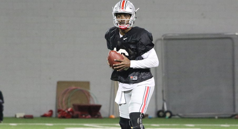 J.T. Barrett says the progress in Ohio State's passing game is going "really well" this summer.