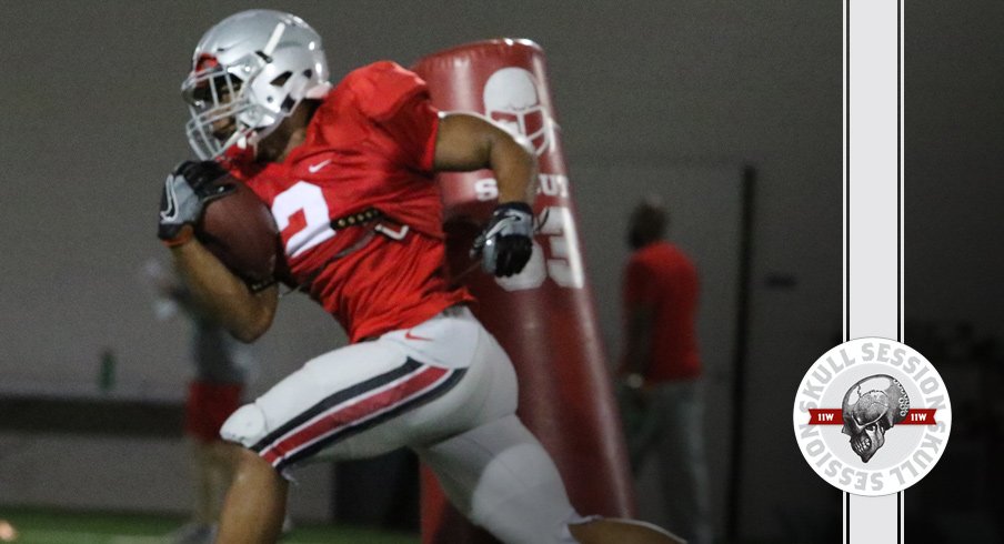 J.K. Dobbins breaks a tackle for the July 20 2017 Skull Session